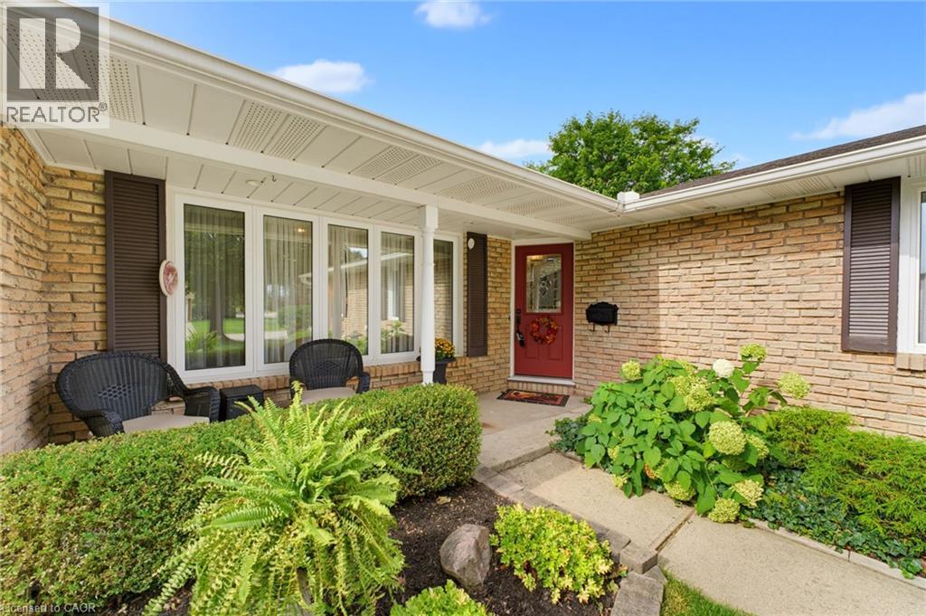 Brick exterior with white trim - 15 Mclaren Avenue N, Listowel, ON