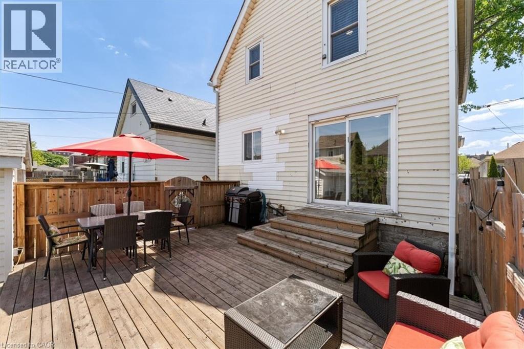 Expansive wood deck with a privacy fence - 17 Craigmiller Avenue, Hamilton, ON