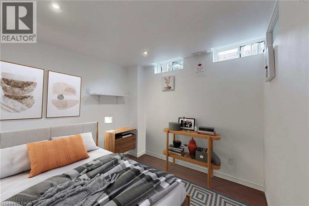 Recessed ceiling lighting, wood-finish flooring, and white walls - 21 Eastview Gate Unit# 36, Brampton, ON