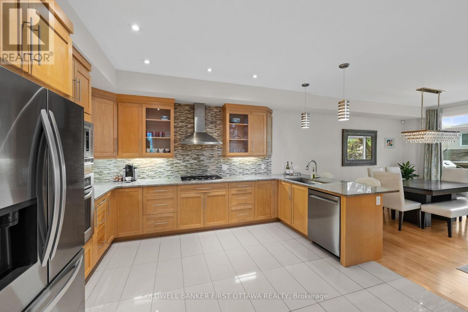 Spacious tiled kitchen w granite countertops. - 155 Nora Street, Ottawa, ON