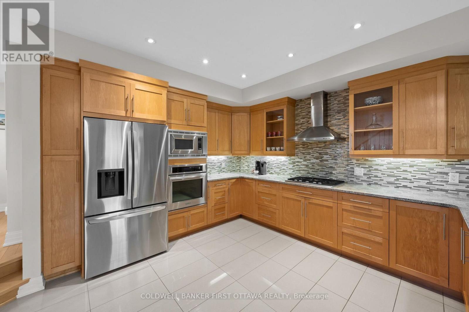 All stainless steel appliances & tiled backsplash. - 155 Nora Street, Ottawa, ON