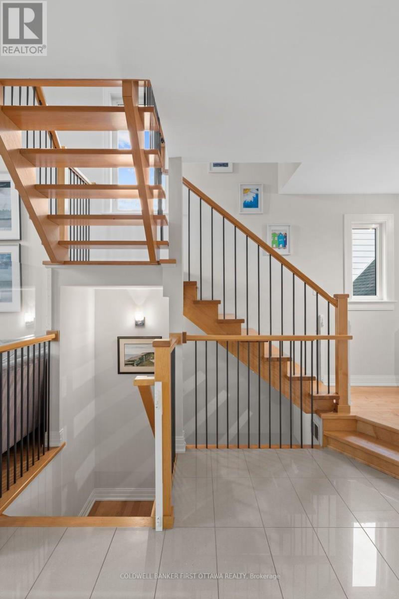 Open riser staircase to access all levels. - 155 Nora Street, Ottawa, ON