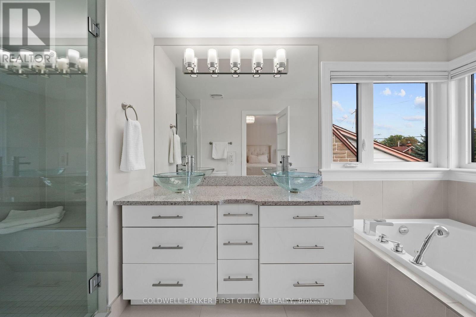 Primary includes a luxury 5 pc ensuite bath. - 155 Nora Street, Ottawa, ON