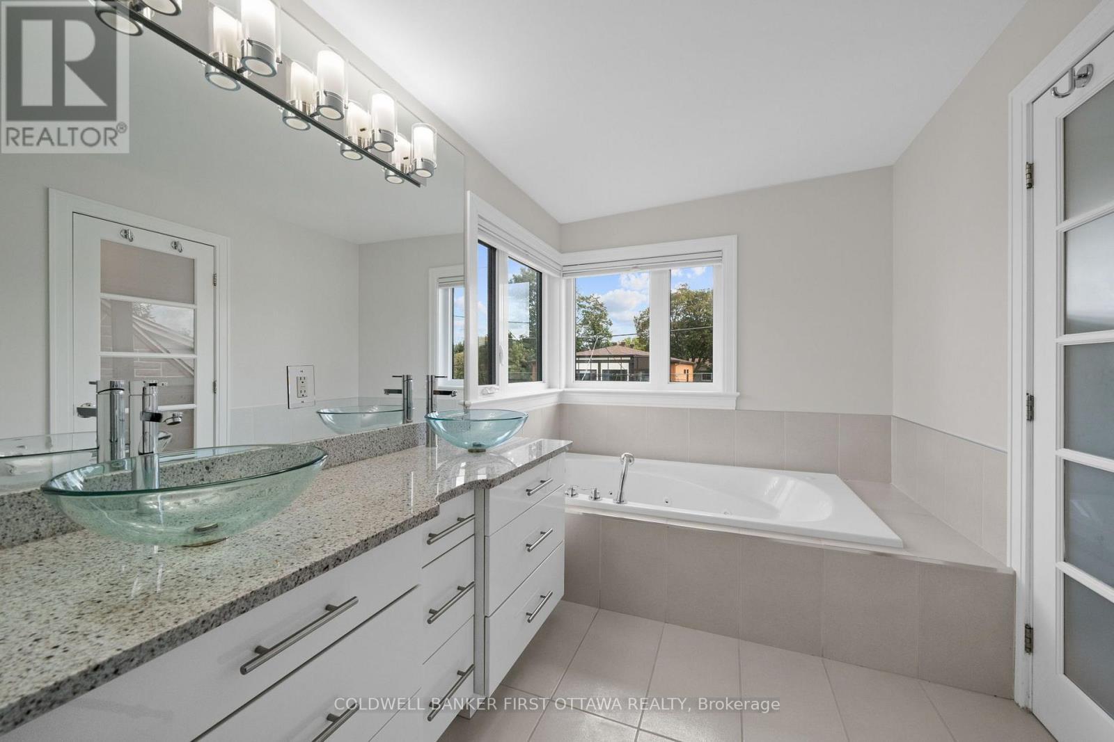 Stand alone jacuzzi soaker tub for relaxing nights - 155 Nora Street, Ottawa, ON