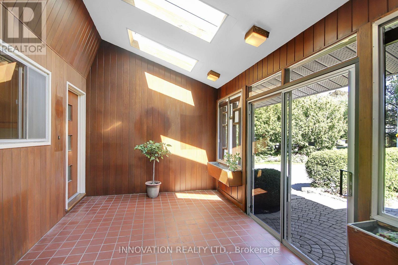 Solarium leads two 2 entrances - 1136 Castle Hill Crescent, Ottawa, ON