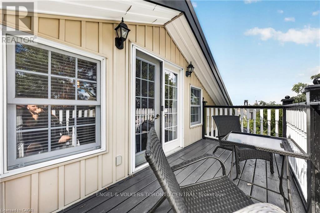 Deck with dark wood-finish flooring - 100 Brunswick Street, Stratford, ON