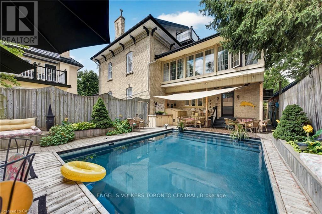 Swimming pool with composite decking surround - 100 Brunswick Street, Stratford, ON