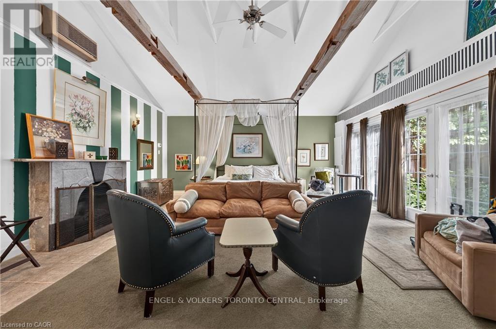 Vaulted ceiling with exposed wood beams - 100 Brunswick Street, Stratford, ON