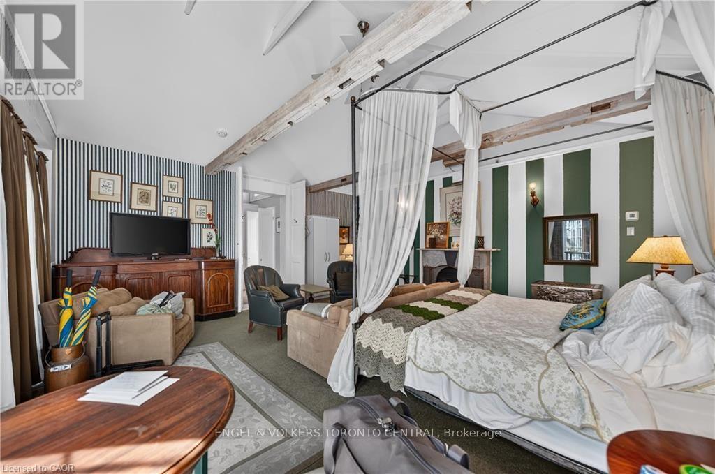 Vaulted ceilings with exposed beams - 100 Brunswick Street, Stratford, ON