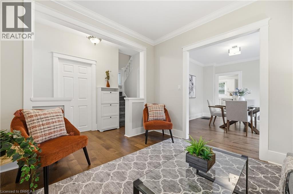 Hardwood flooring throughout, recessed lighting, and crown molding - 87 Strathcona Avenue, Brantford, ON