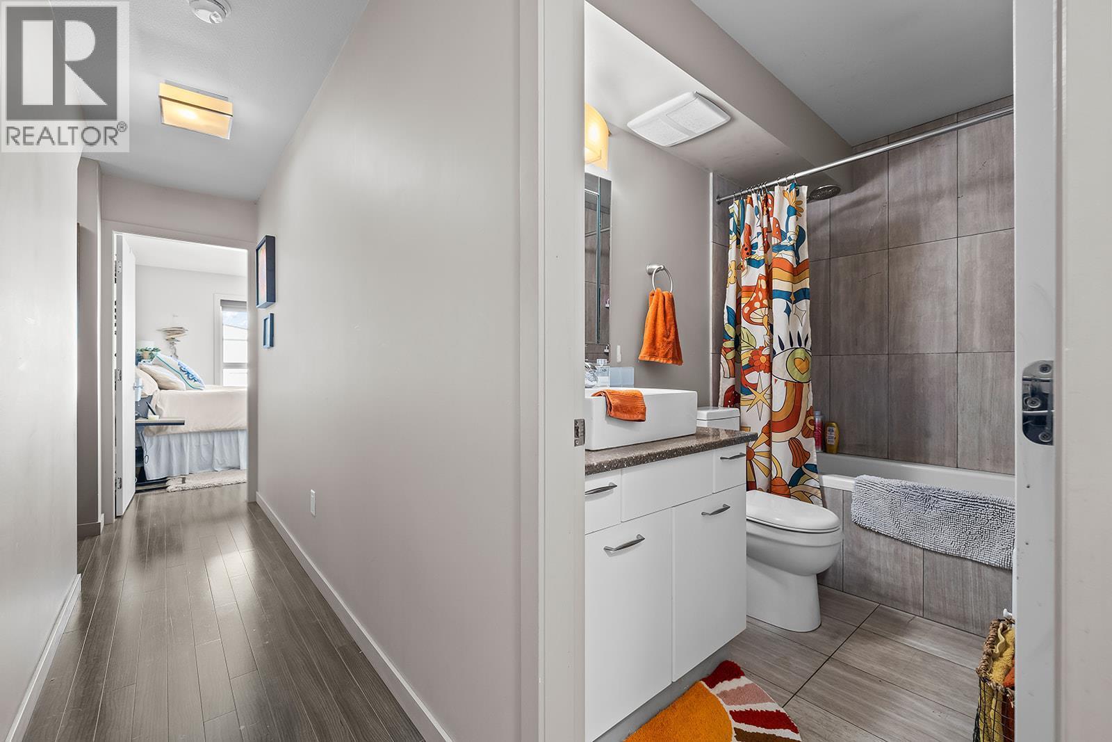Hallway and Bathroom on Upper Level - 1851 Ambrosi Road Unit# 11, Kelowna, BC