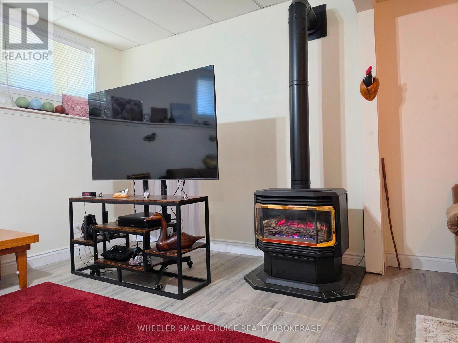 Natural gas fireplace in the family room - 78 Maple Street, South Stormont, ON