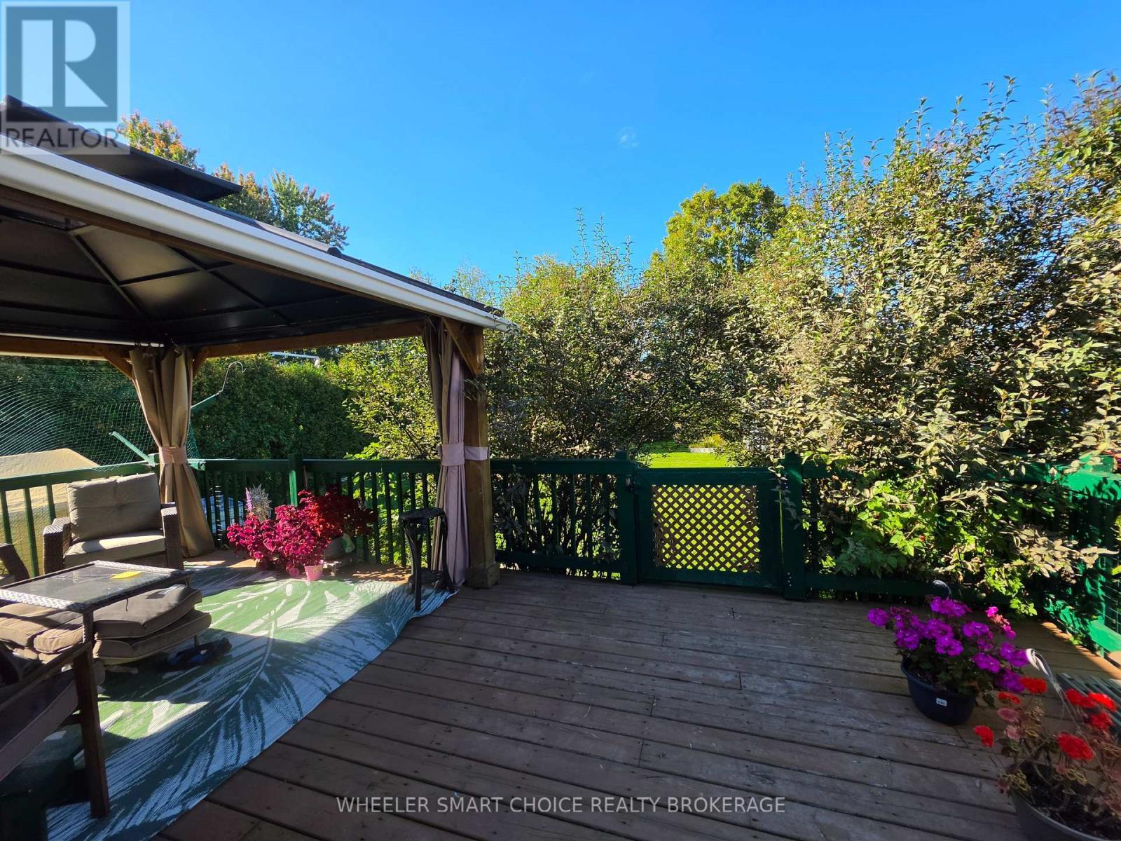 Deck is surrounde with lilac bushes - 78 Maple Street, South Stormont, ON