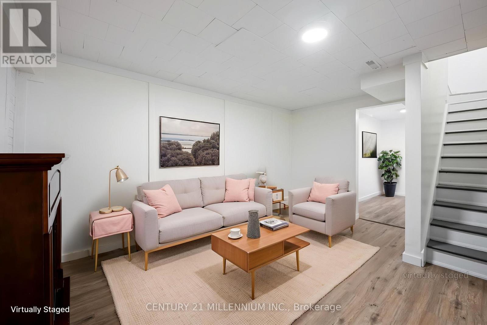 Lower-level living room - virtually staged - 139 Town Line, Orangeville, ON