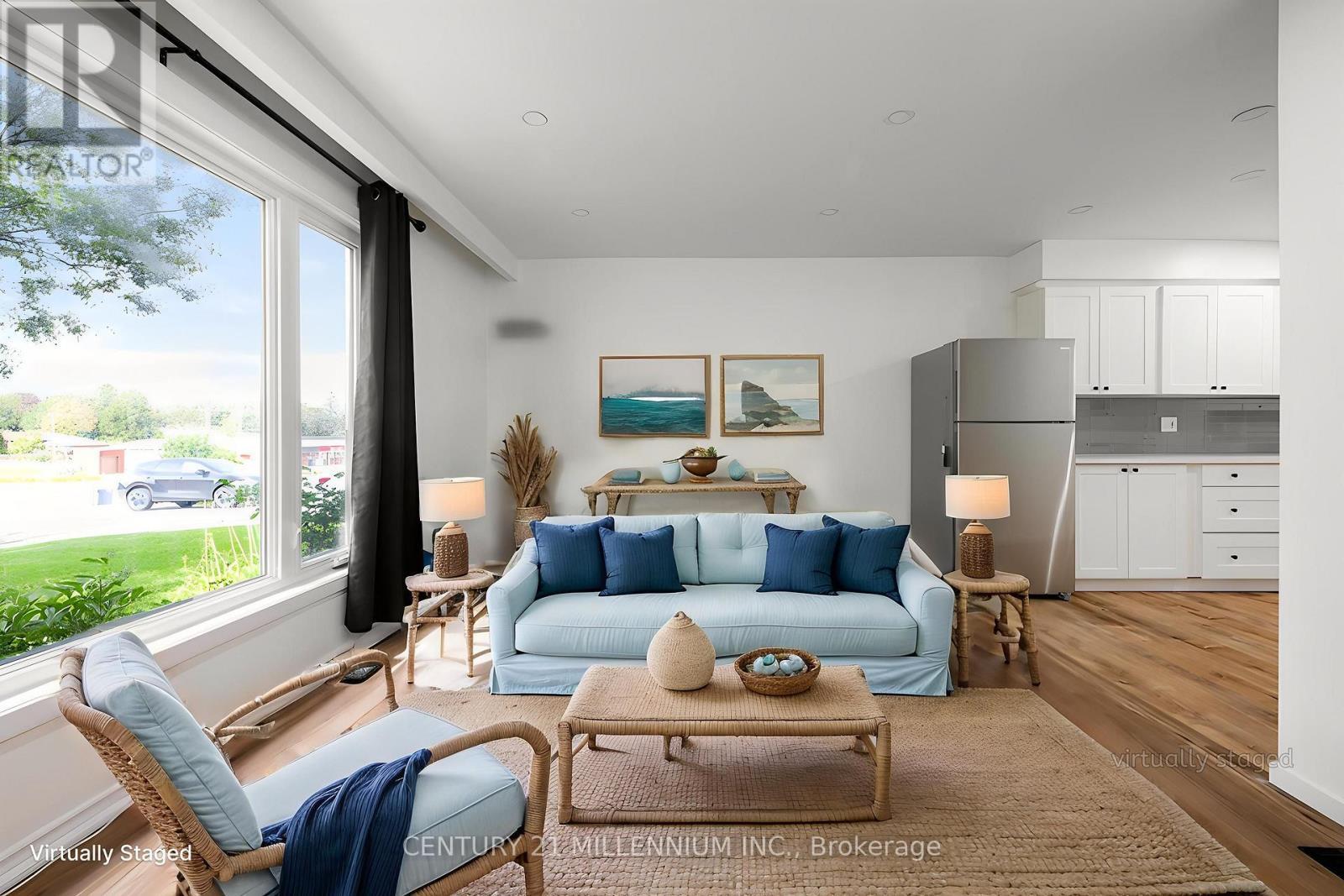 Living room, open to kitchen - virtually staged - 139 Town Line, Orangeville, ON