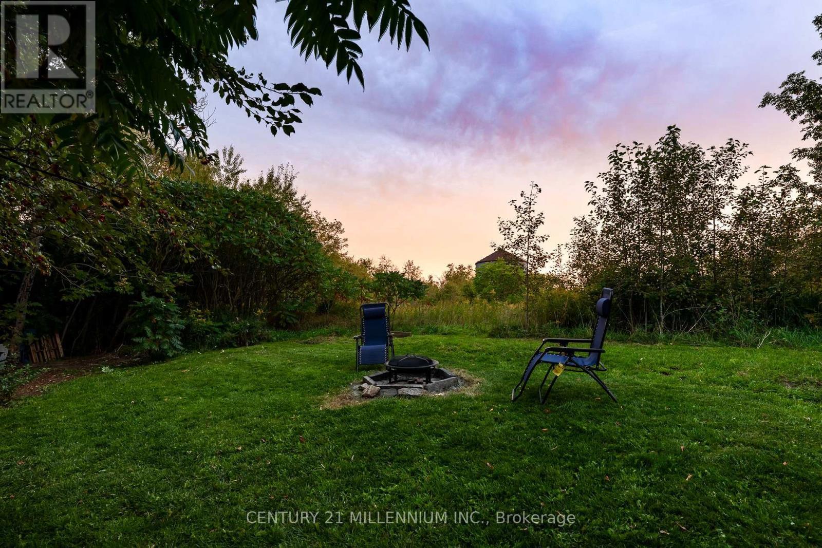 Fire pit beside the farm fields - 139 Town Line, Orangeville, ON