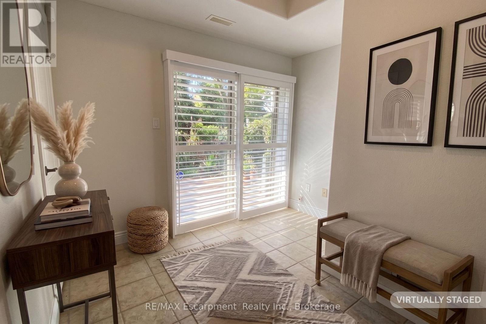 virtually staged den walk out - 2430 Second Street, Burlington (Brant), ON