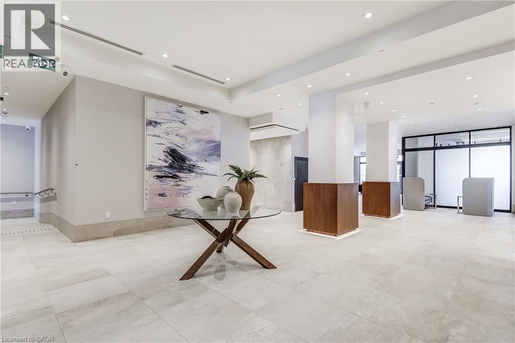 Recessed lighting illuminates the expansive tiled flooring and smooth wall finishes - 58 Windward Drive, Grimsby, ON