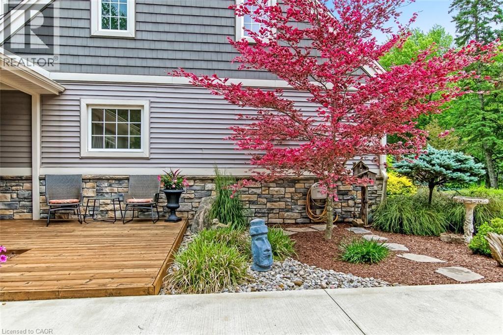 Driveway side patio and entry - 59 Decou Road, Simcoe, ON