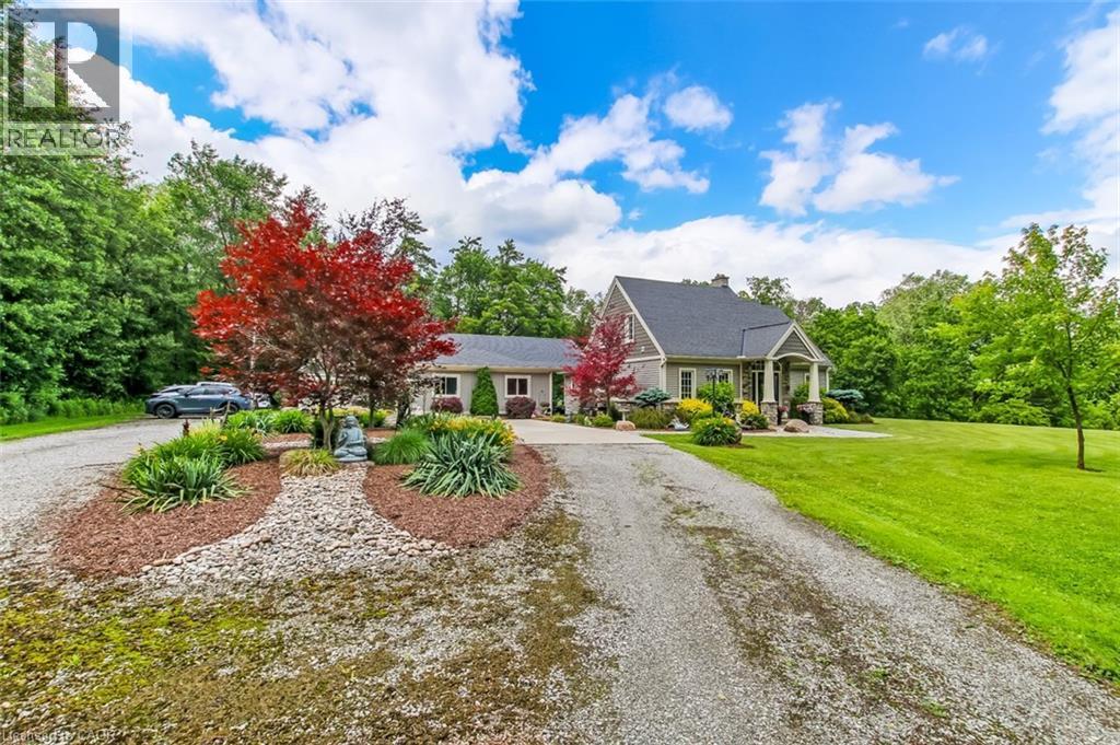 Set well back from the road to ensure privacy. - 59 Decou Road, Simcoe, ON