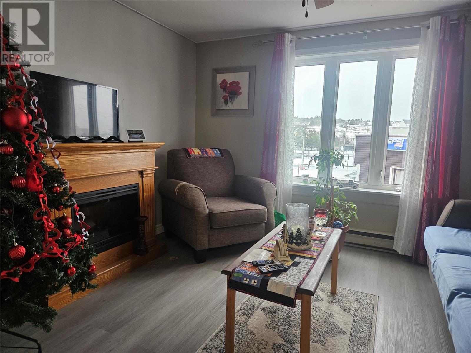 Living Room - Main Floor Unit - 28 Water Street W, St. Lawrence, NL