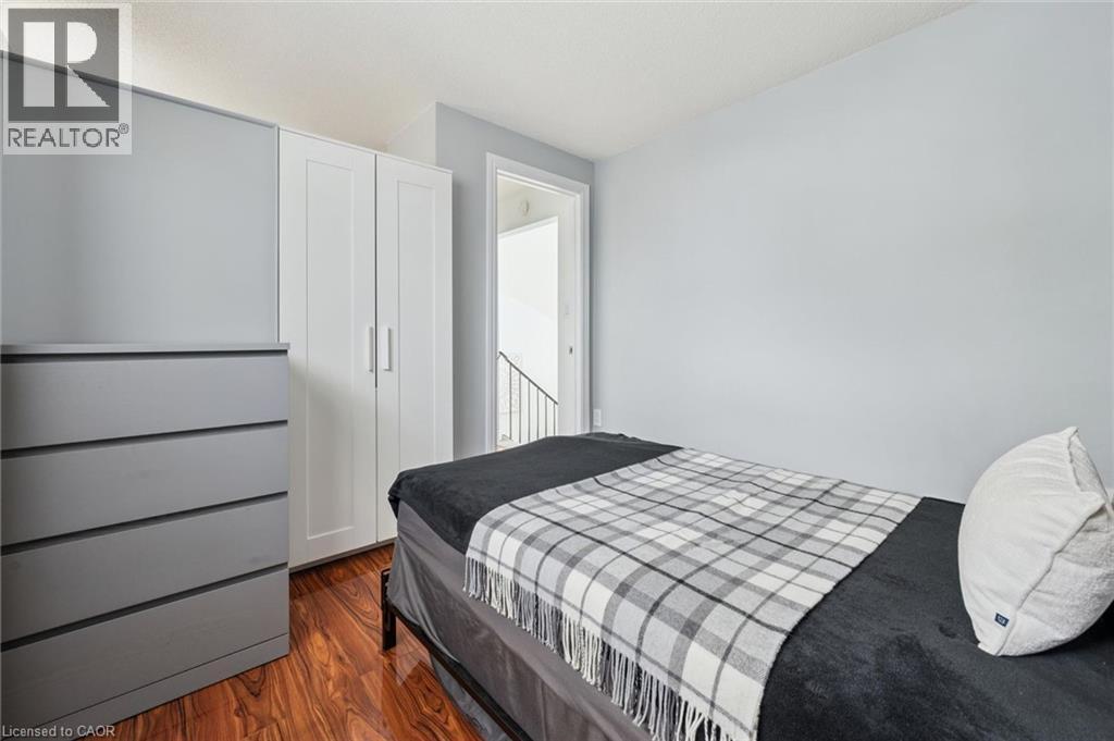 Wood-finish flooring with a subtle sheen - 54 Green Valley Drive Unit# 13, Kitchener, ON