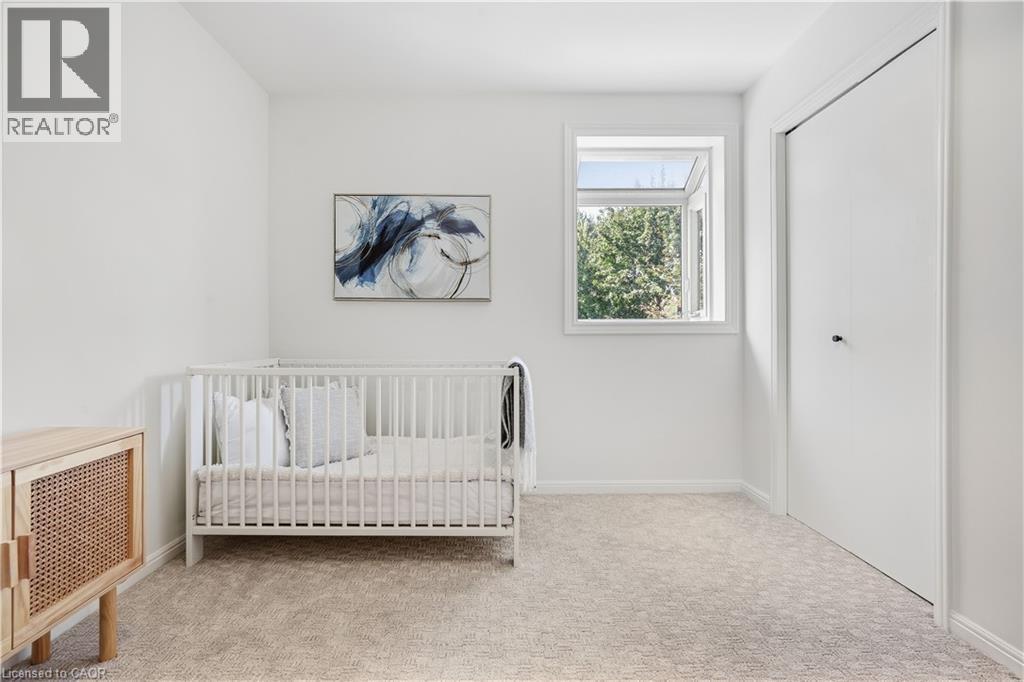 Neutral-toned wall-to-wall carpeting - 4159 Spruce Avenue, Burlington, ON
