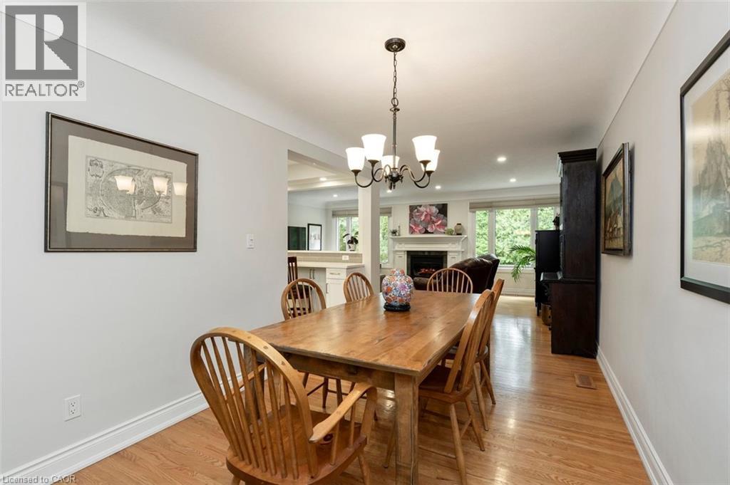 Staircase with wood treads and carpet runners to bedroom level - 200 Woodview Crescent, Ancaster, ON