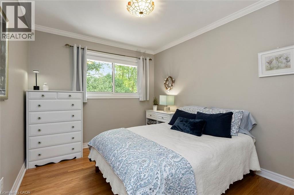 Family Bathroom with white vanity, tub/shower and heated tile floors - 200 Woodview Crescent, Ancaster, ON