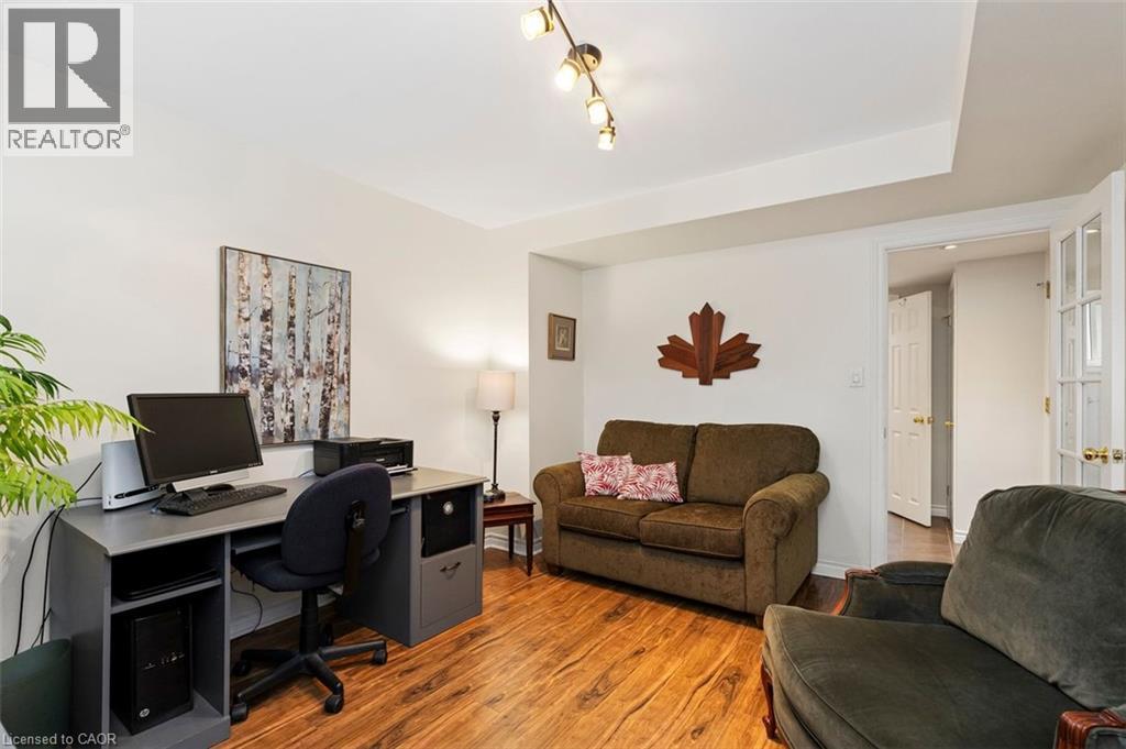 Lower level recreation room flexible for tv room, exercise room, home office or guests - 200 Woodview Crescent, Ancaster, ON