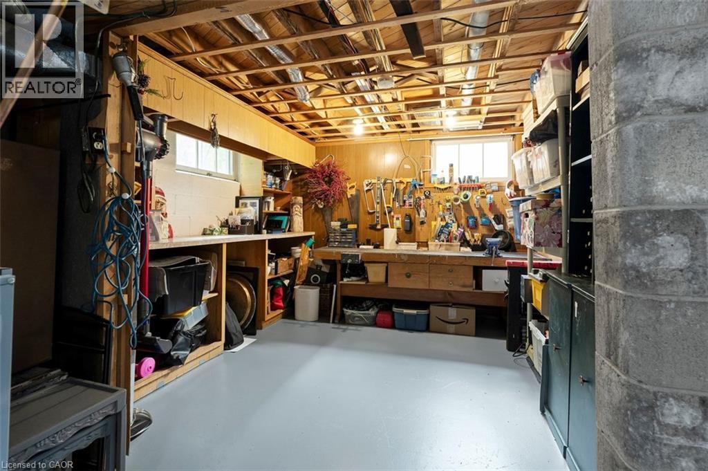 Bathroom with shower adjacent to office/den and mudroom entry from garage - 200 Woodview Crescent, Ancaster, ON