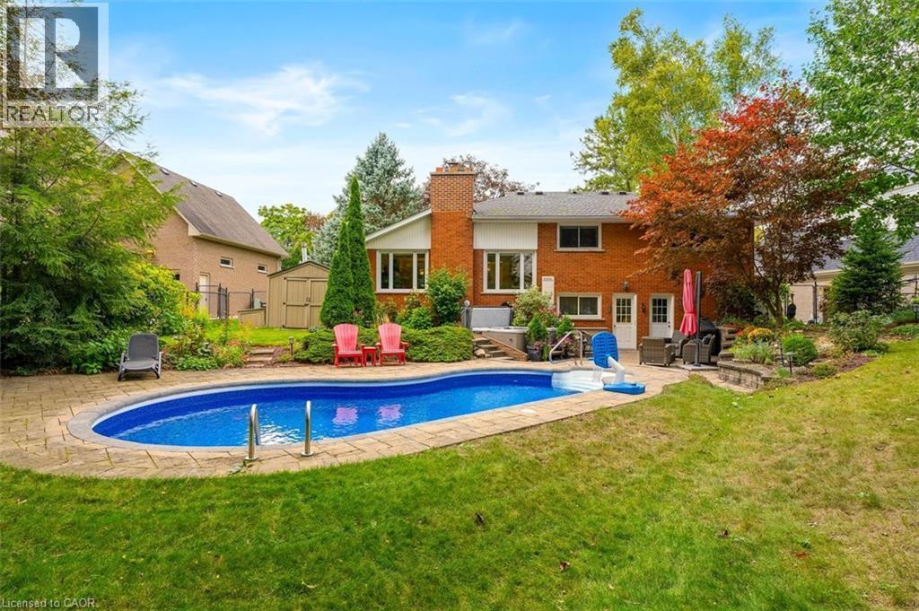 Backyard view of pathway from side gate into backyard - 200 Woodview Crescent, Ancaster, ON
