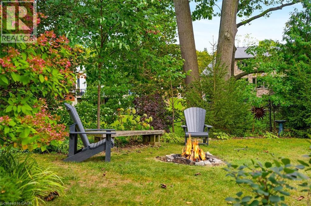 Side entry to garage, gate to rear yard and second storage shed included - 200 Woodview Crescent, Ancaster, ON