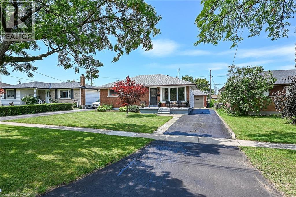 Brick exterior with a gabled roof - 13 Allanburg Road S, St. Catharines, ON