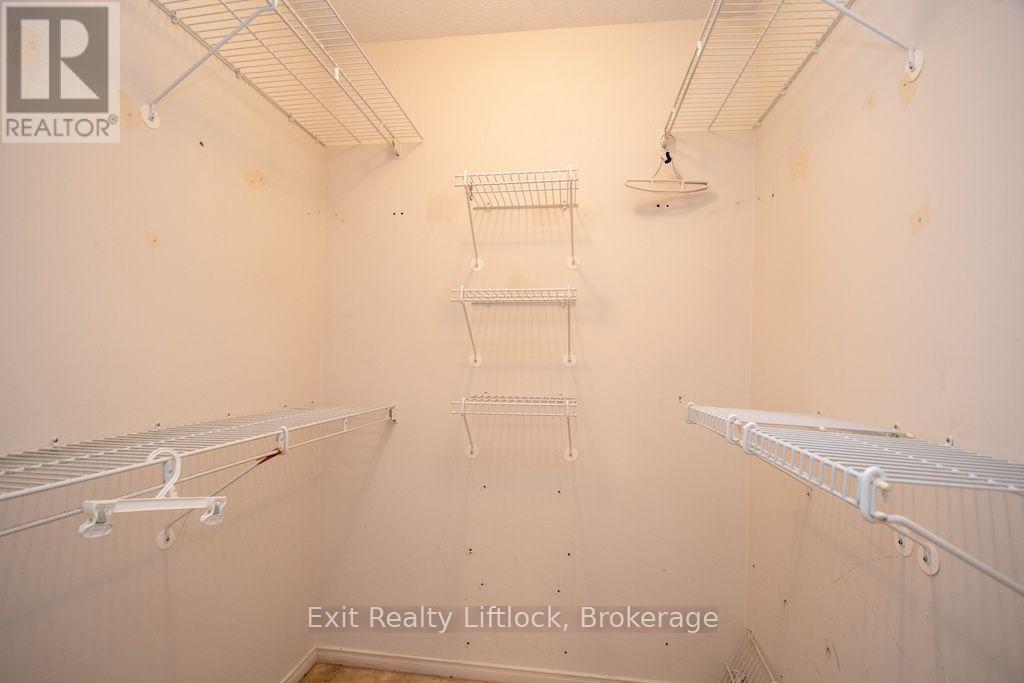 Primary Bedroom Walk-in Closet - 202 C - 1099 Clonsilla Avenue, Peterborough (Otonabee Ward 1), ON