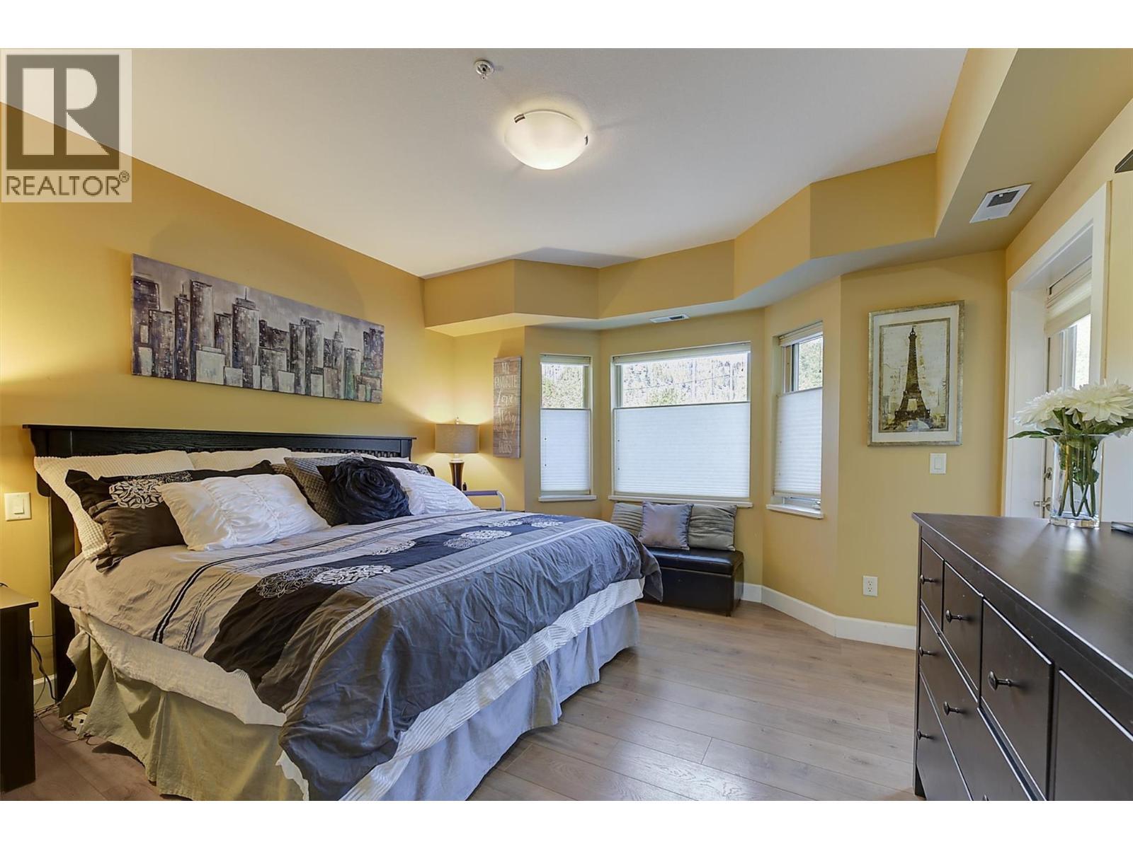 Primary Bedroom. - 3996 Beach Avenue Unit# 236, Peachland, BC