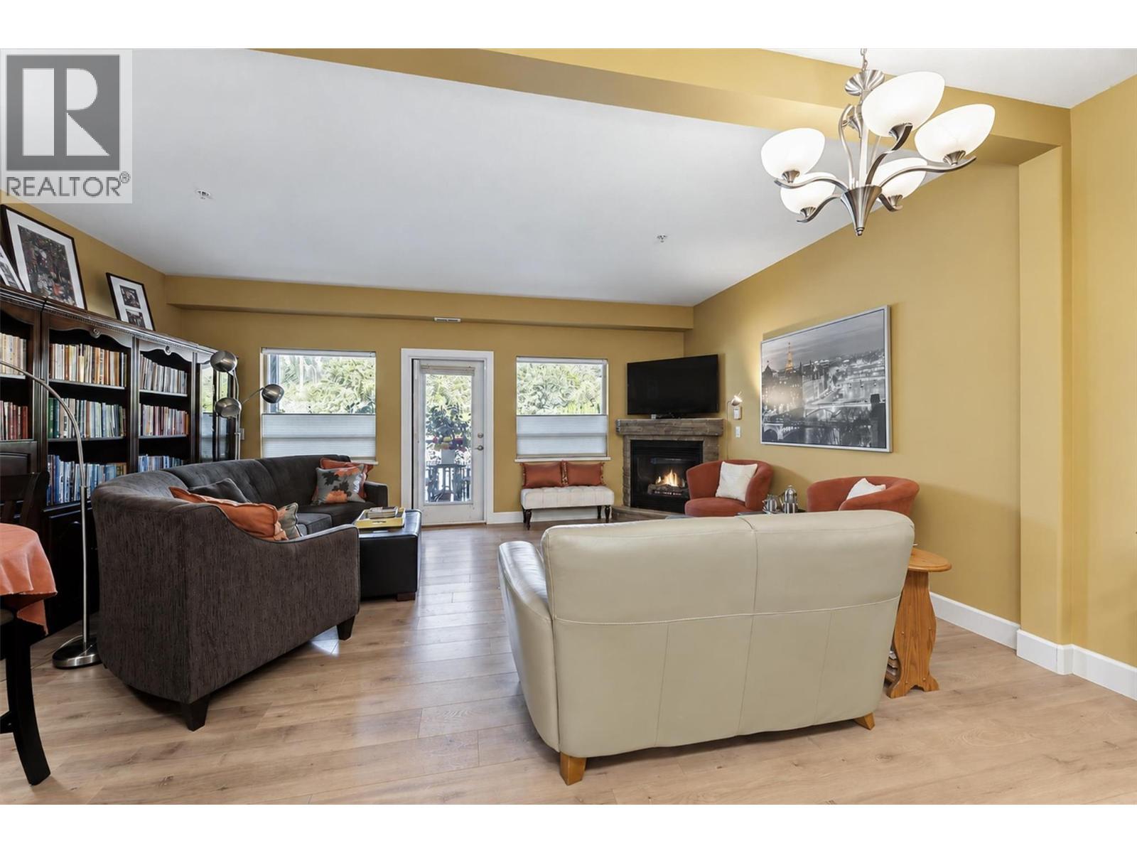 LVRM with Corner Gas Fireplace - 3996 Beach Avenue Unit# 236, Peachland, BC