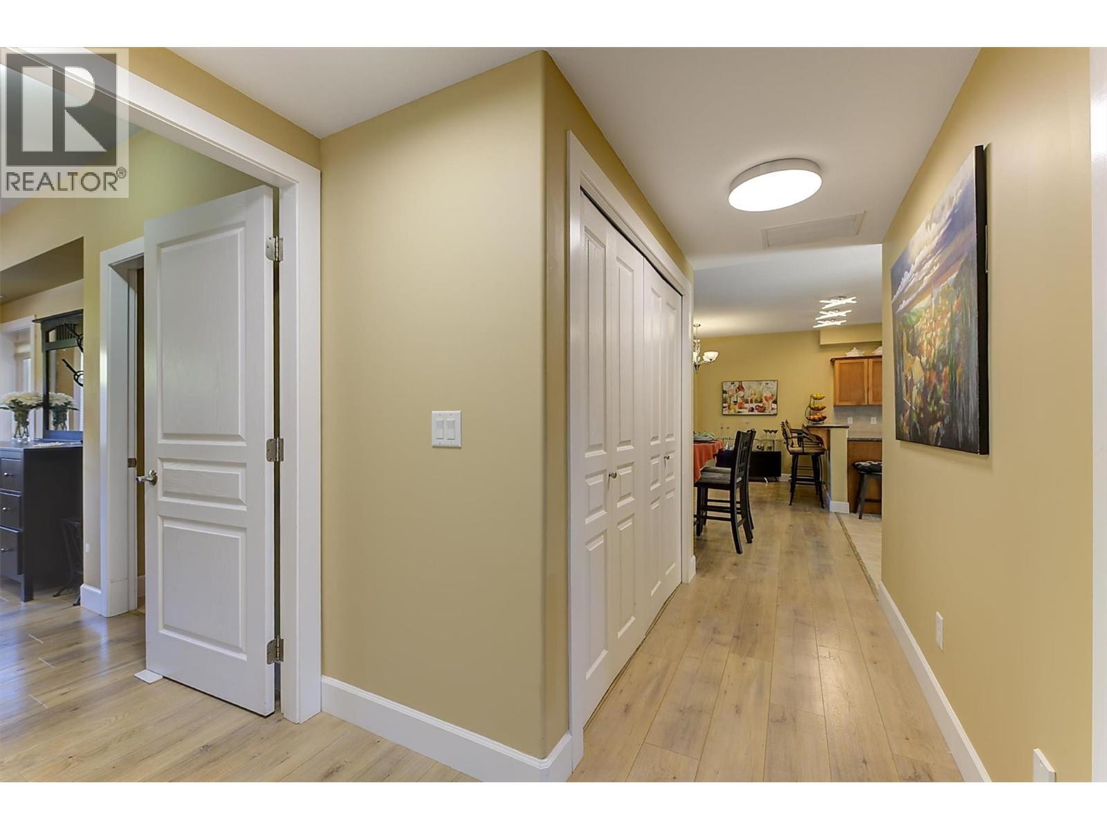 Hall Showing Laundry Closet. - 3996 Beach Avenue Unit# 236, Peachland, BC