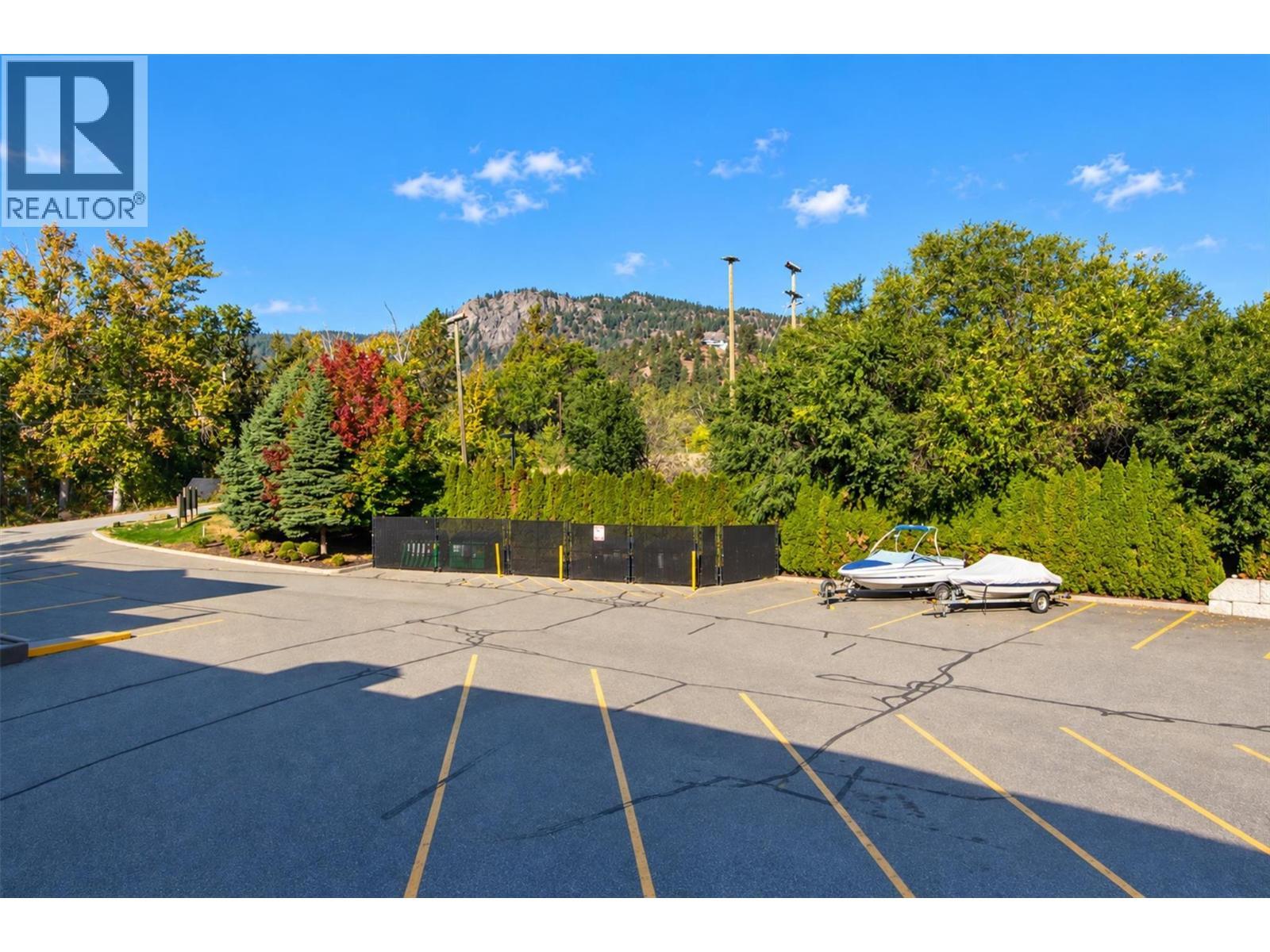 Parking lot. - 3996 Beach Avenue Unit# 236, Peachland, BC