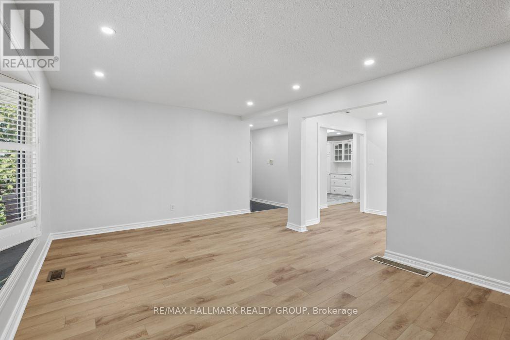 Hardwood and pot-lighting throughout. - 211 Harcourt Avenue, Ottawa, ON