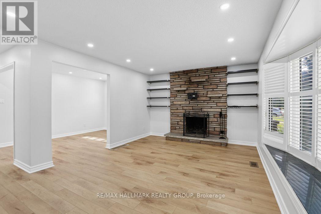 Floor to ceiling FP for cozy nights around a fire. - 211 Harcourt Avenue, Ottawa, ON