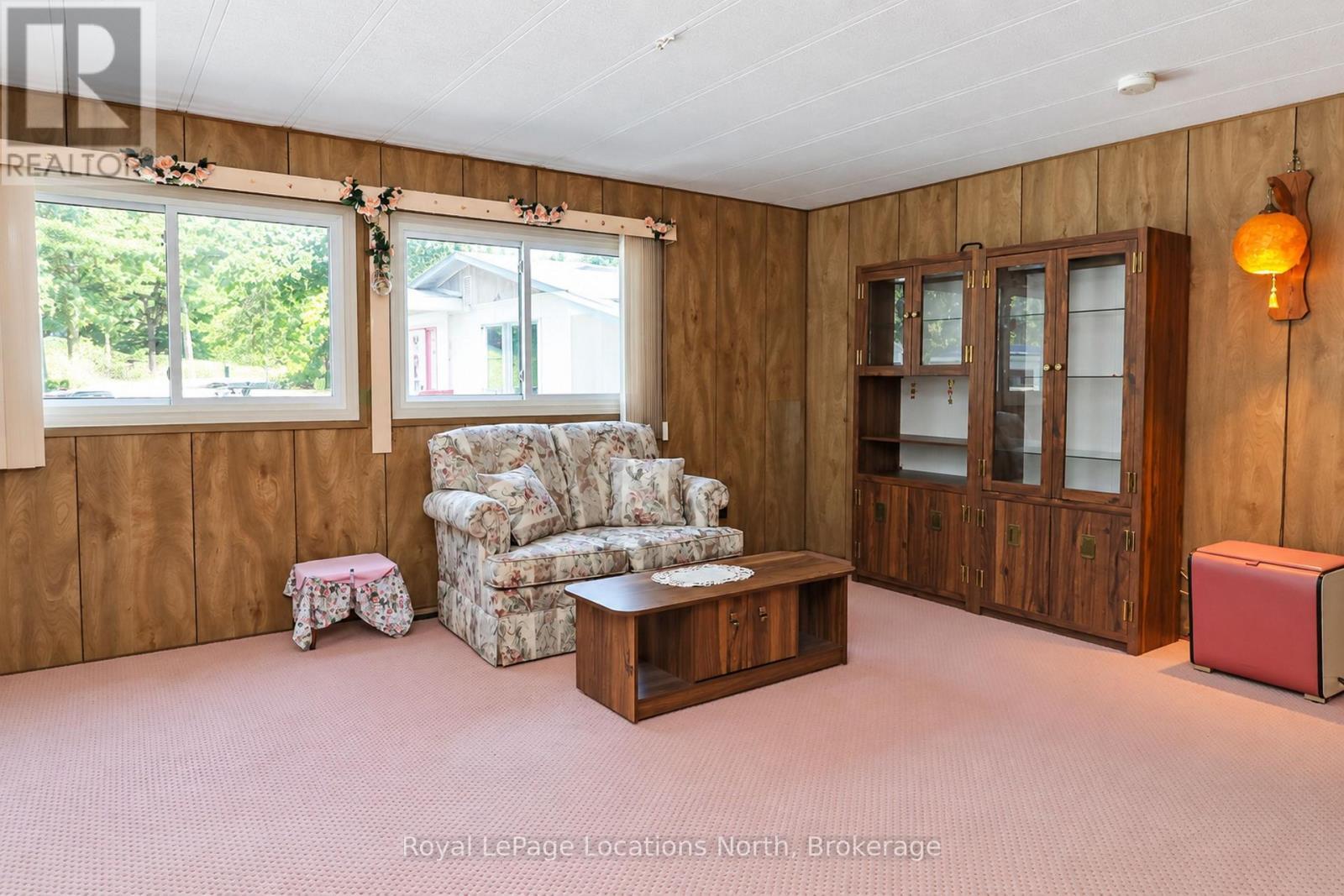Two big, bright windows in living room - Photo 2 - 16 Sinclair Avenue S, Wasaga Beach, ON