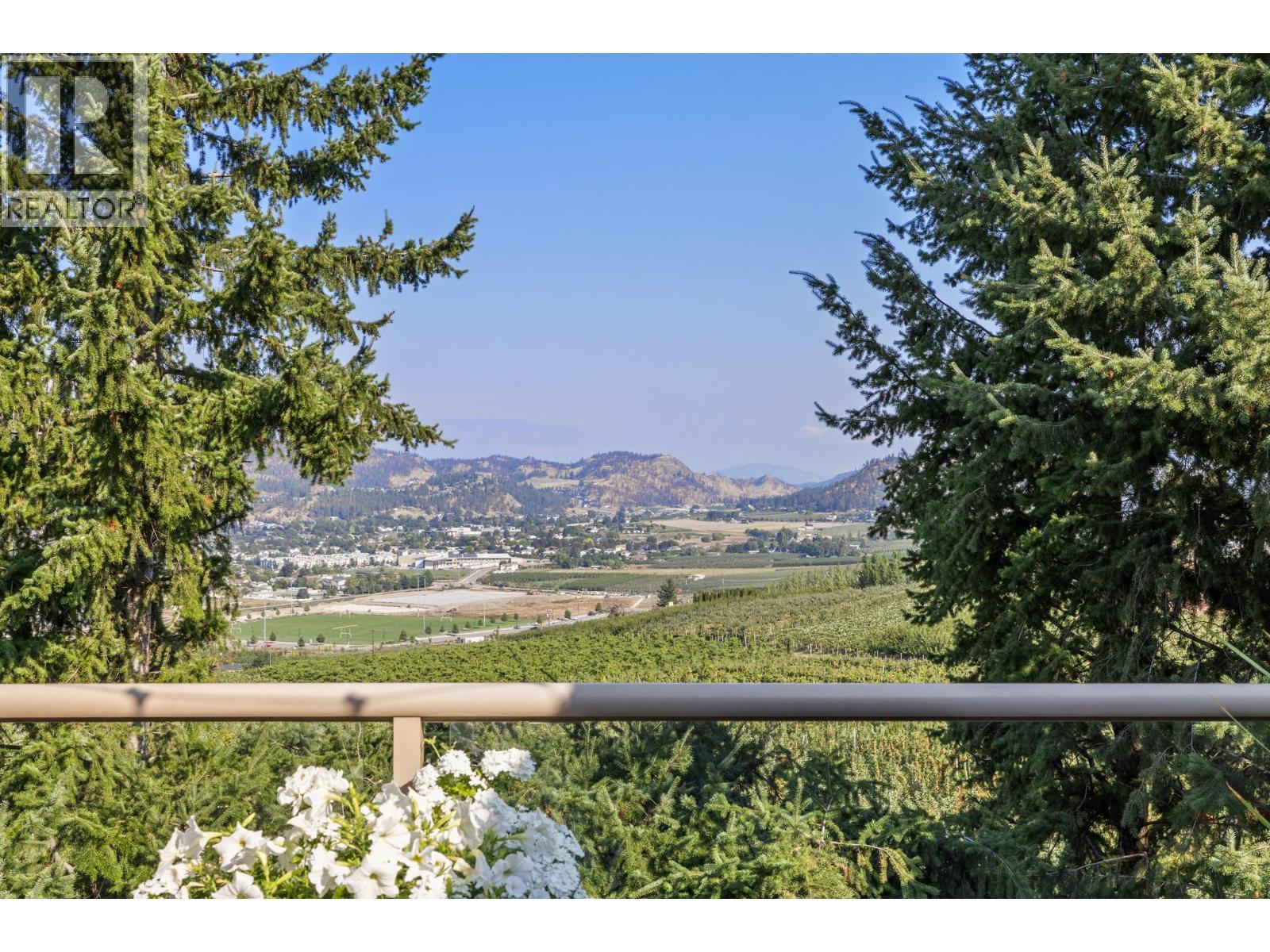 Upper and lower decks to enjoy unobstructed views over the valley and vinyards - 2300 Silver Place Unit# 3, Kelowna, BC