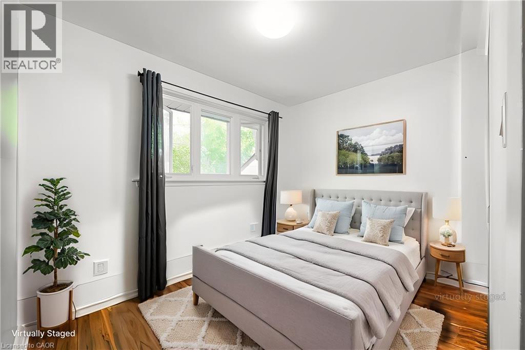 Primary bedroom – virtually staged - 139 Town Line, Orangeville, ON