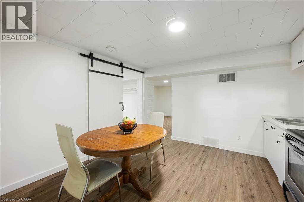 Lower-level kitchen and dining - 139 Town Line, Orangeville, ON