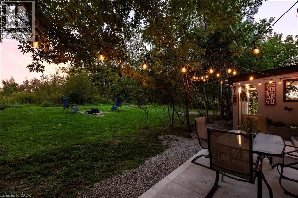 Patio looking out to the yard - 139 Town Line, Orangeville, ON