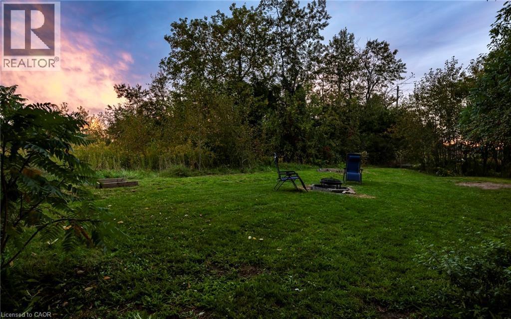 Side lot at sunset - 139 Town Line, Orangeville, ON