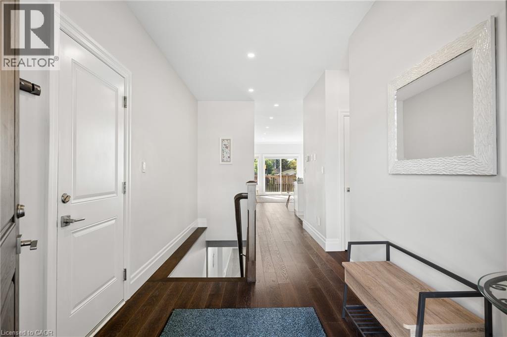 Hardwood flooring throughout, recessed lighting, and white trim - 192 Brewery Street Unit# 18, Baden, ON