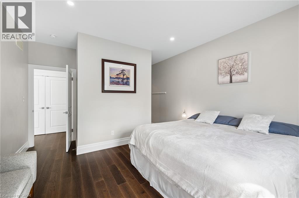 Recessed lighting, wood-finish flooring, white trim, and white paneled doors - 192 Brewery Street Unit# 18, Baden, ON