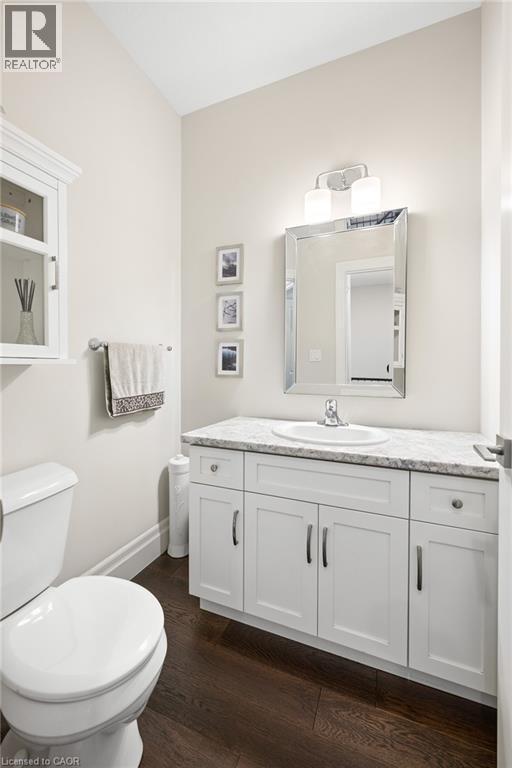 White shaker-style vanity with a light-toned countertop, undermount sink - 192 Brewery Street Unit# 18, Baden, ON